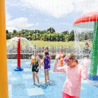 Kids playing in the water at Haruātai Park splashpad thumbnail