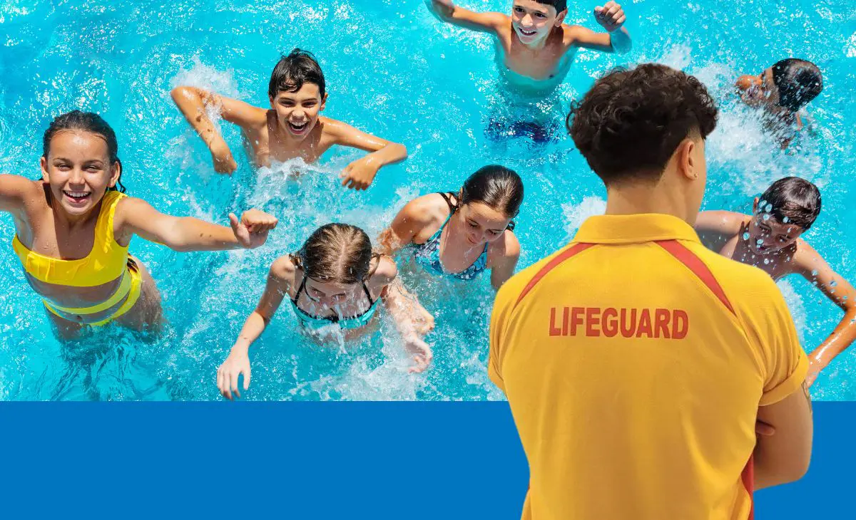 Lifeguard watching over kids in a pool